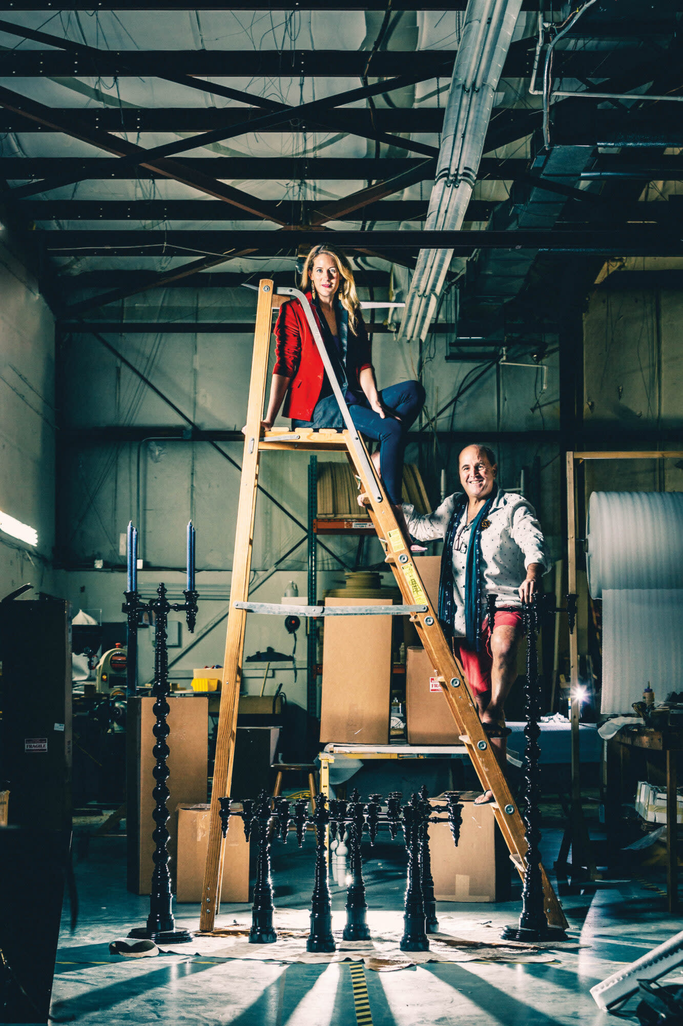 man and woman on ladder