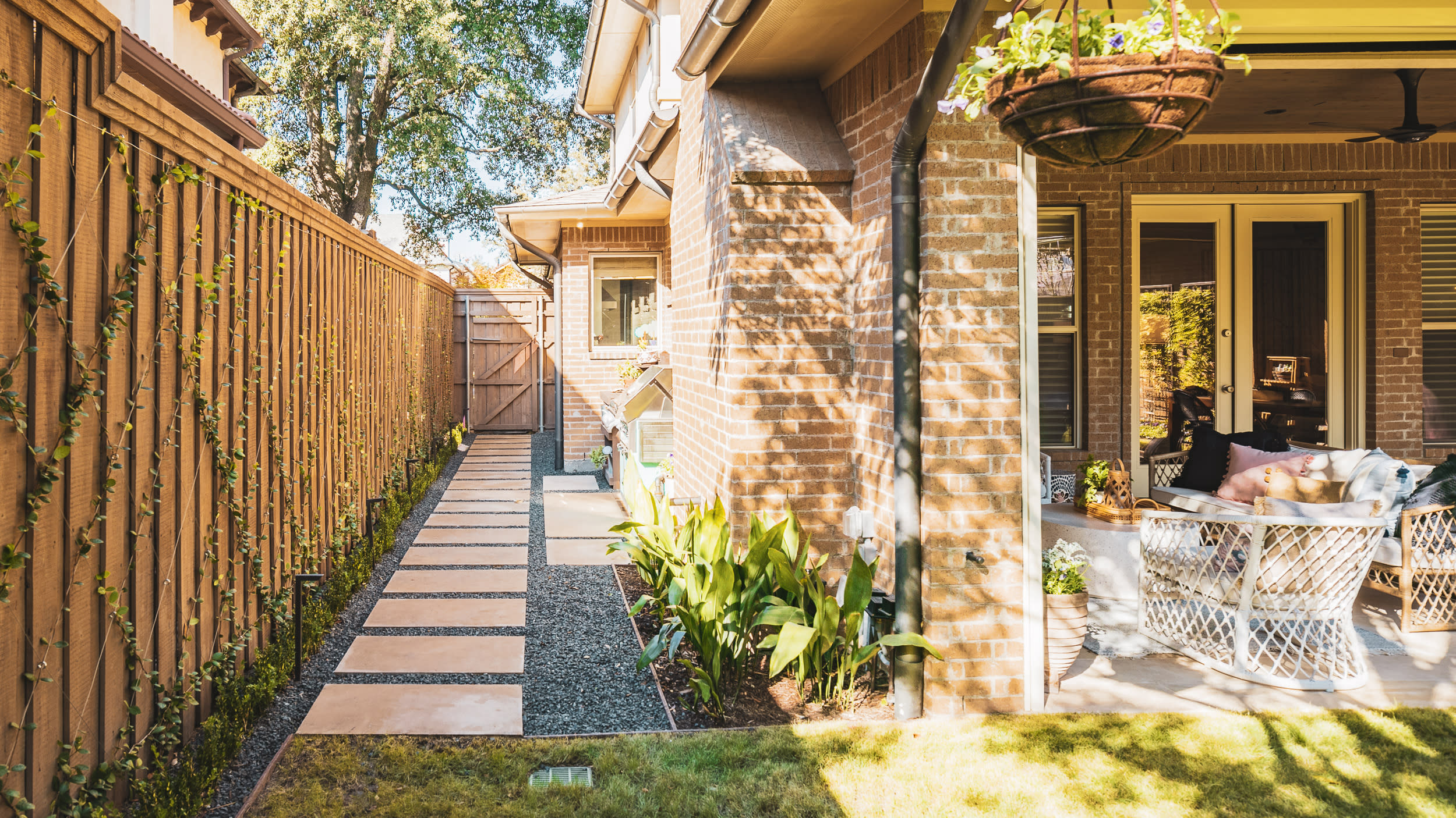 Pathway with concrete pavers and lush landscaping

