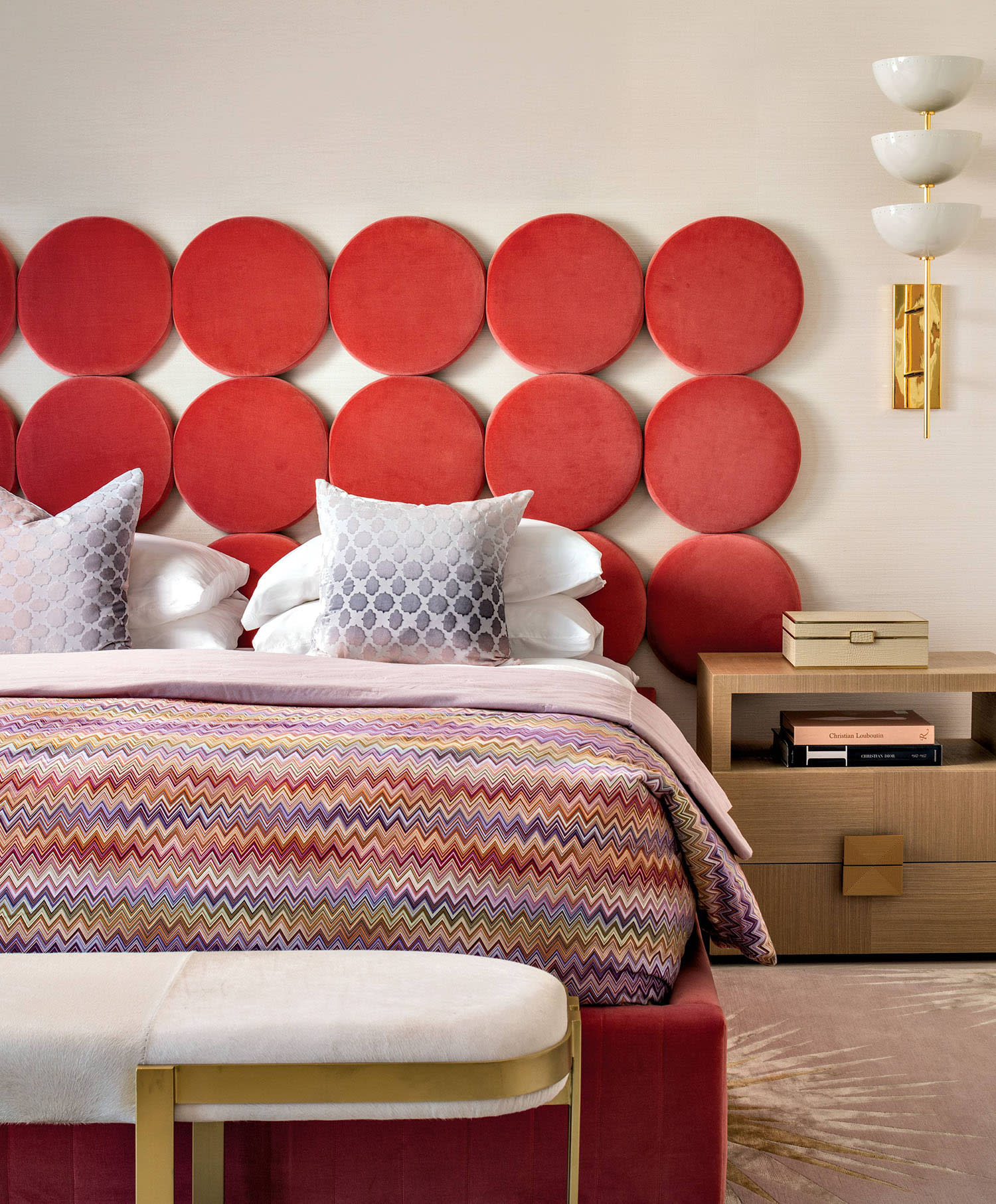 velvet bed with a circular grid headboard in a South Florida condo