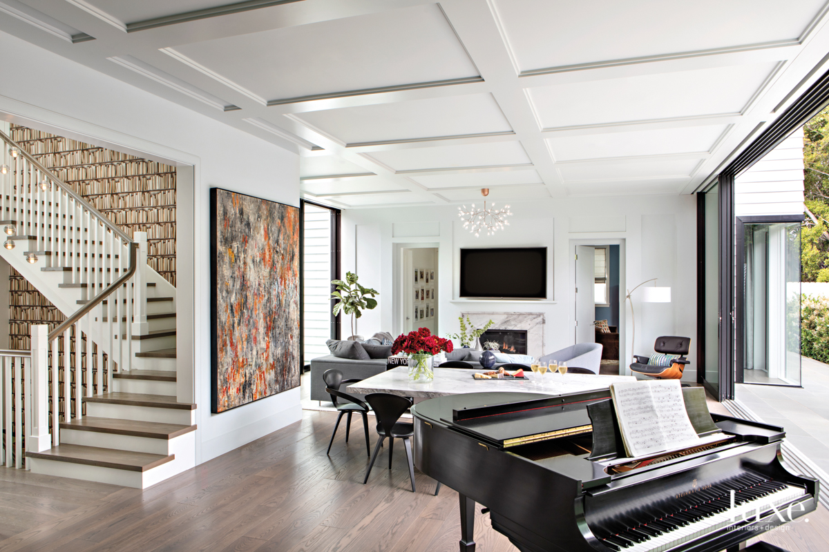 contemporary white great room neutral palette staircase