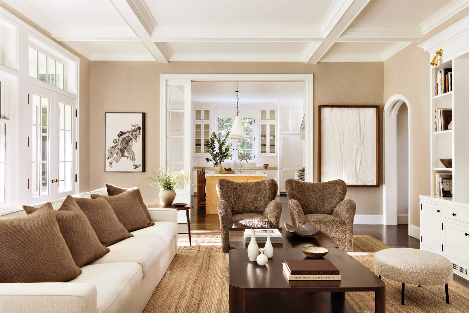 A cozy living room featuring a couch and a coffee table, creating a welcoming atmosphere for relaxation and socializing.