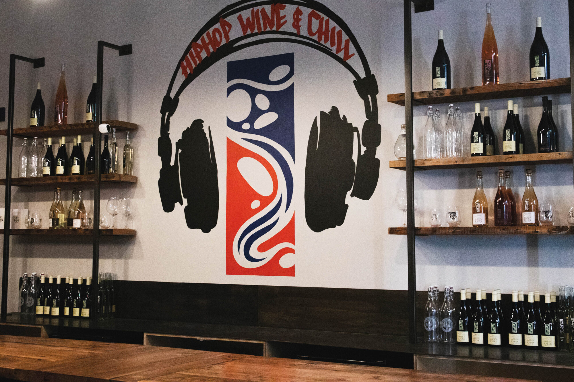 Headphone wall art in a wine shop