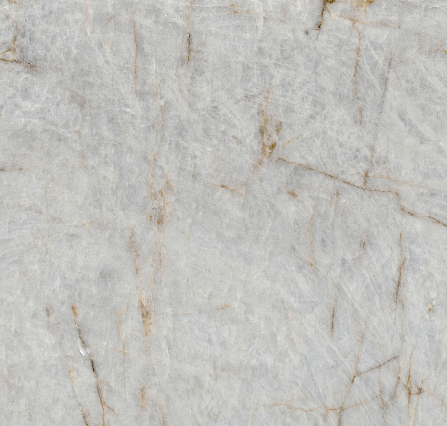 A slab of stone in a marbled white shade with darker veining.