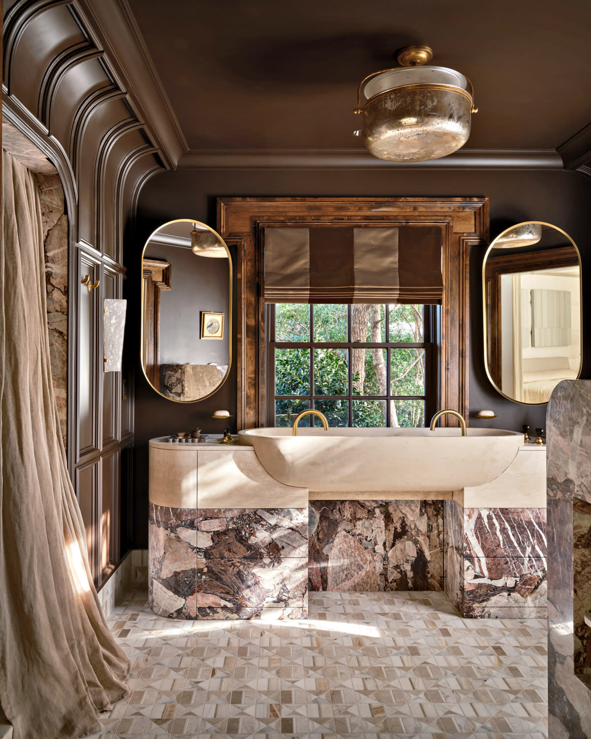 brown hued bathroom with marble vanity