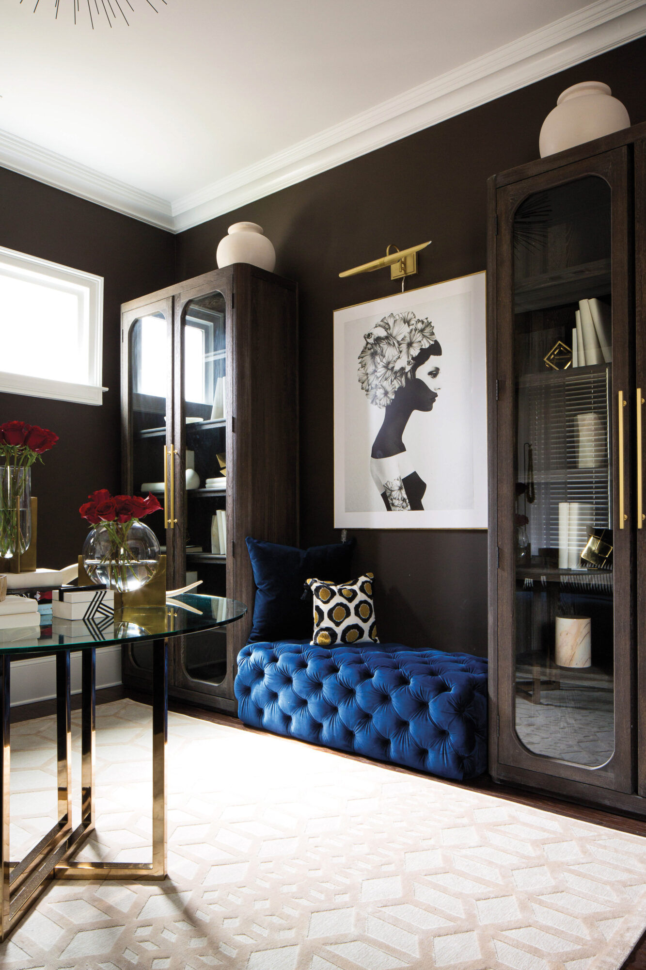 dark room with blue ottoman