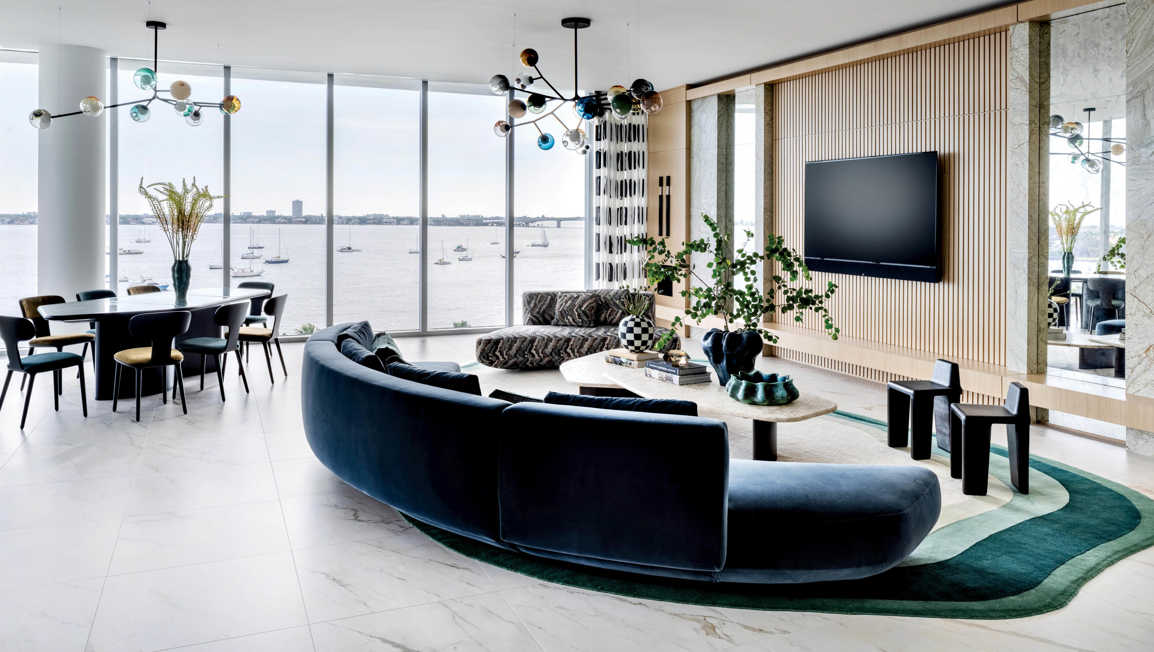 modern living room with views of the water out large windows