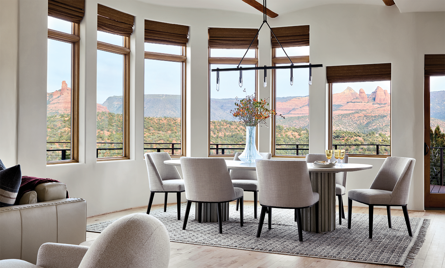 bright white dining room with paneled windows showcasing views of Sedona, Arizona