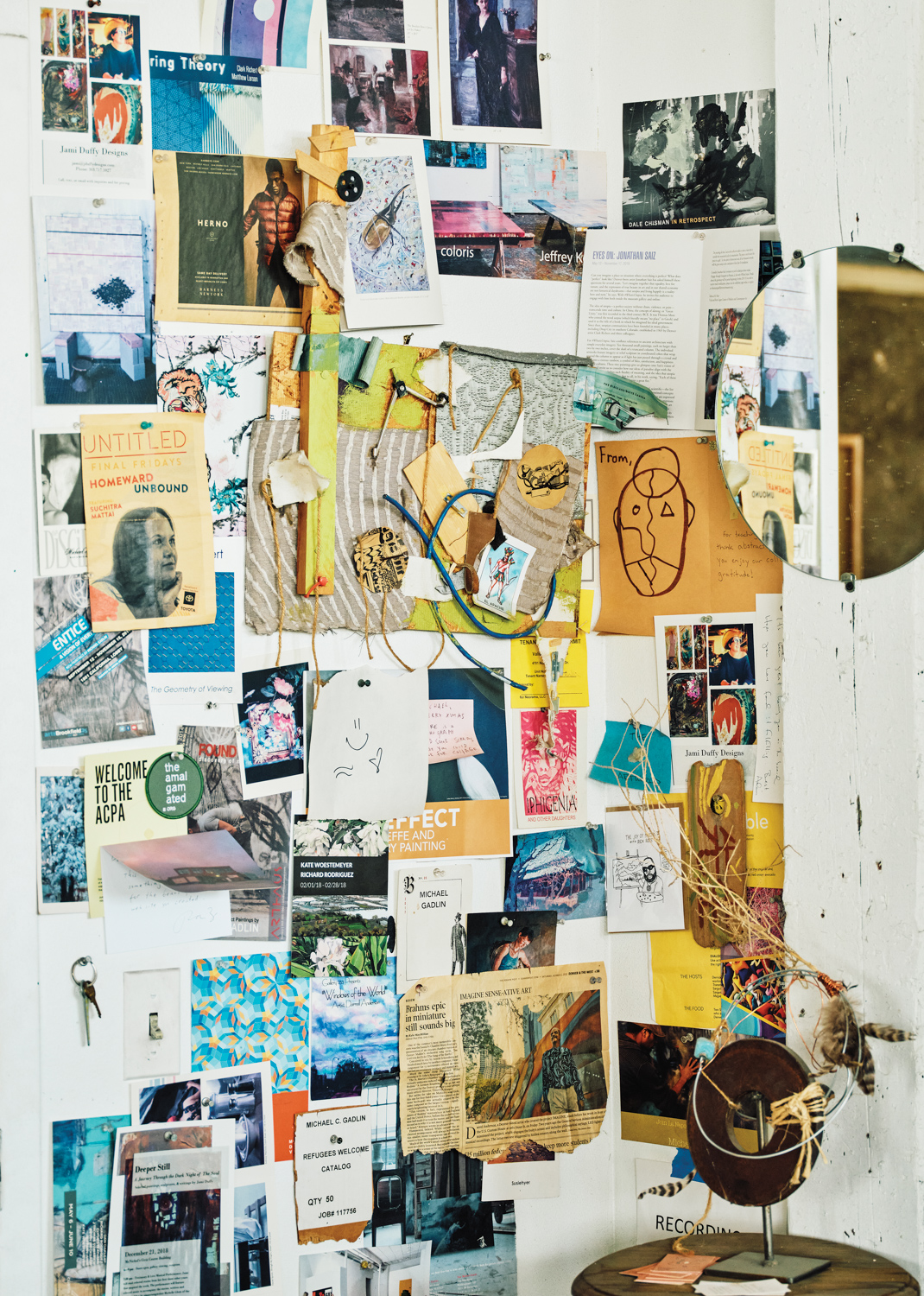 A mood board comprised of clippings, photos and found objects in Michael Gadlin's studio