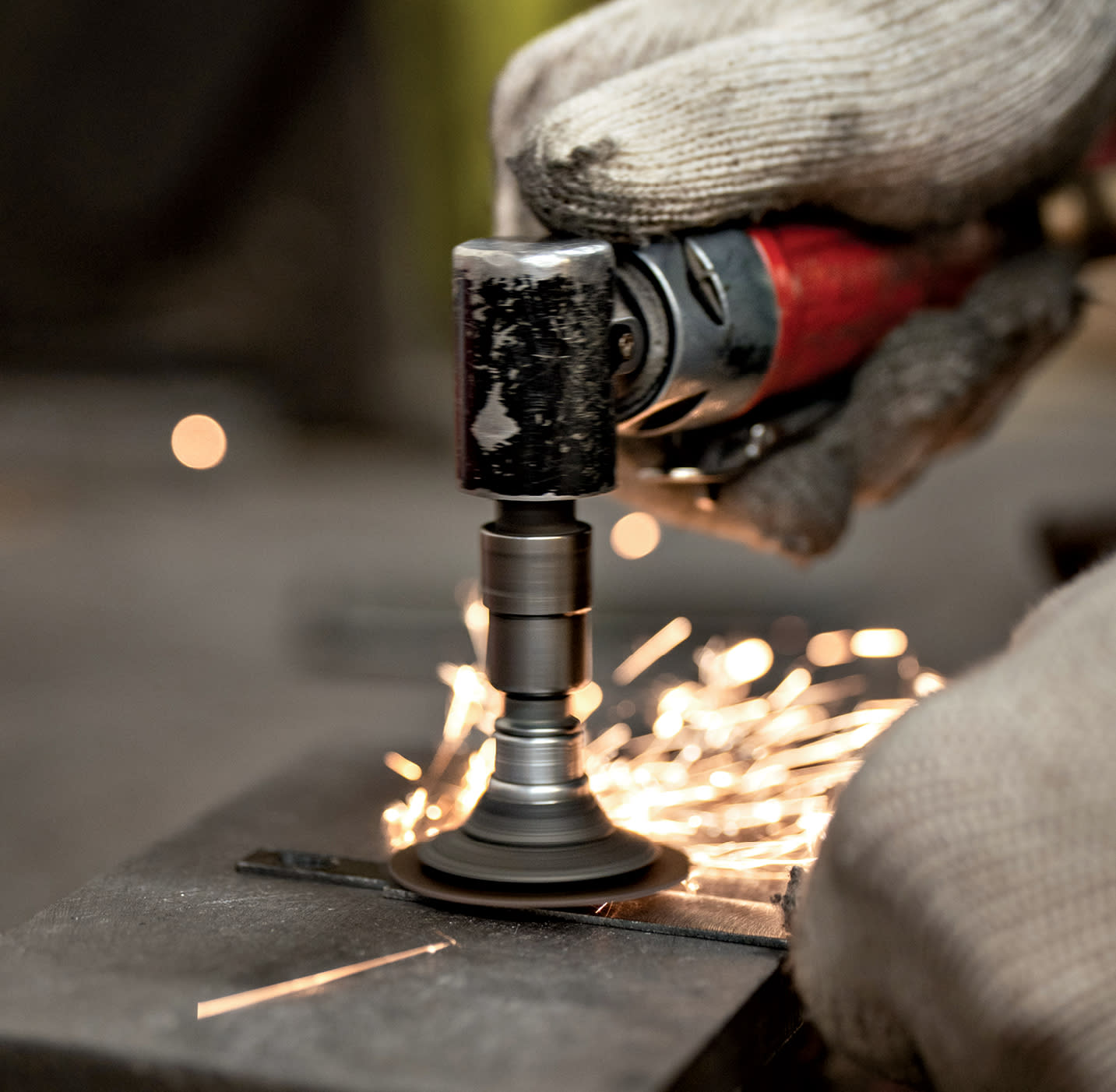 welder working on a lighting fixture