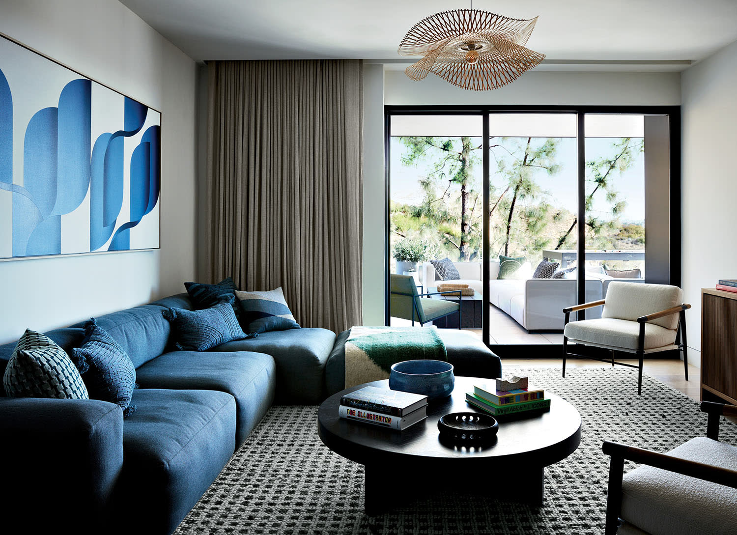 family room with a blue sectional