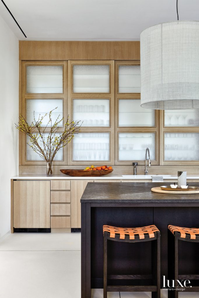 white oak kitchen black island and drum pendant