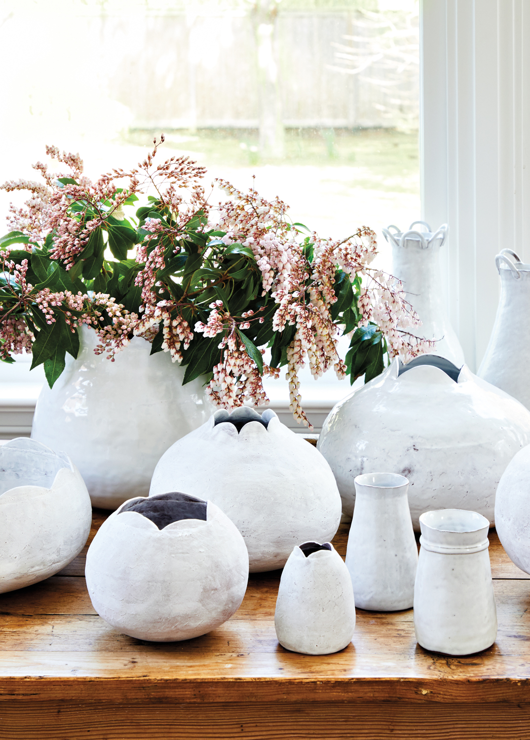 white ceramic vases on a table