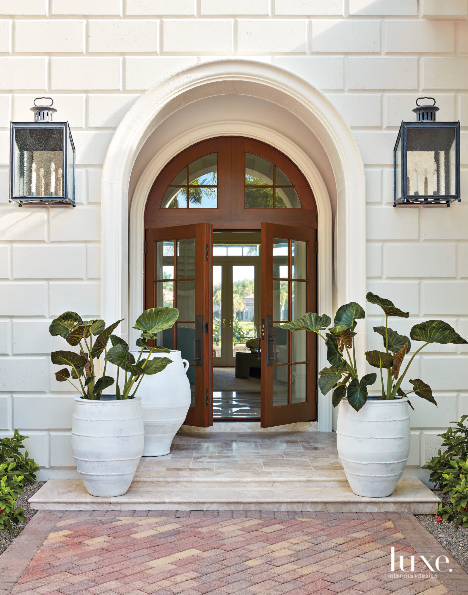 Front door made of glass and wood