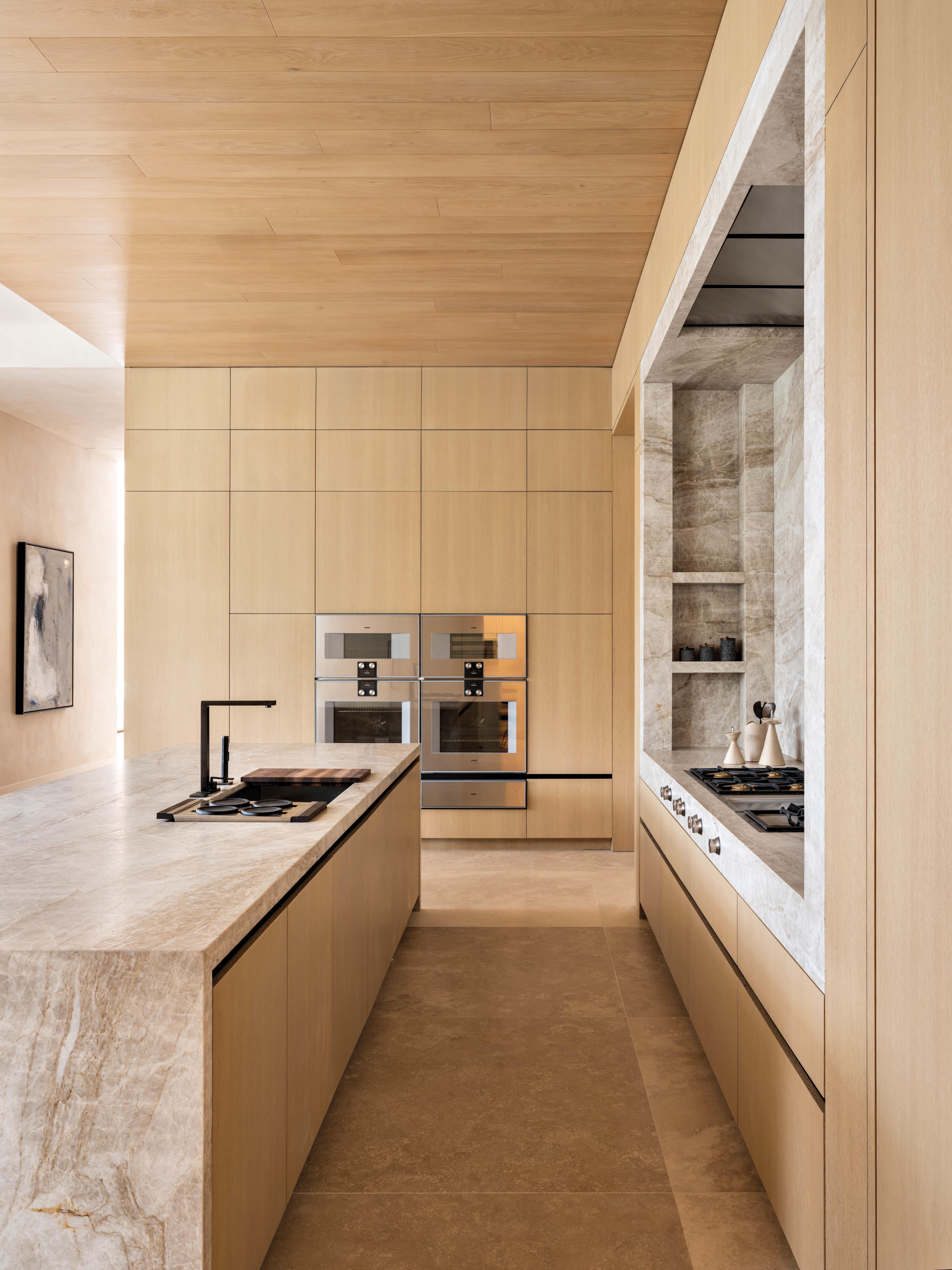 minimalist kitchen with rift-sawn white oak cabinetry