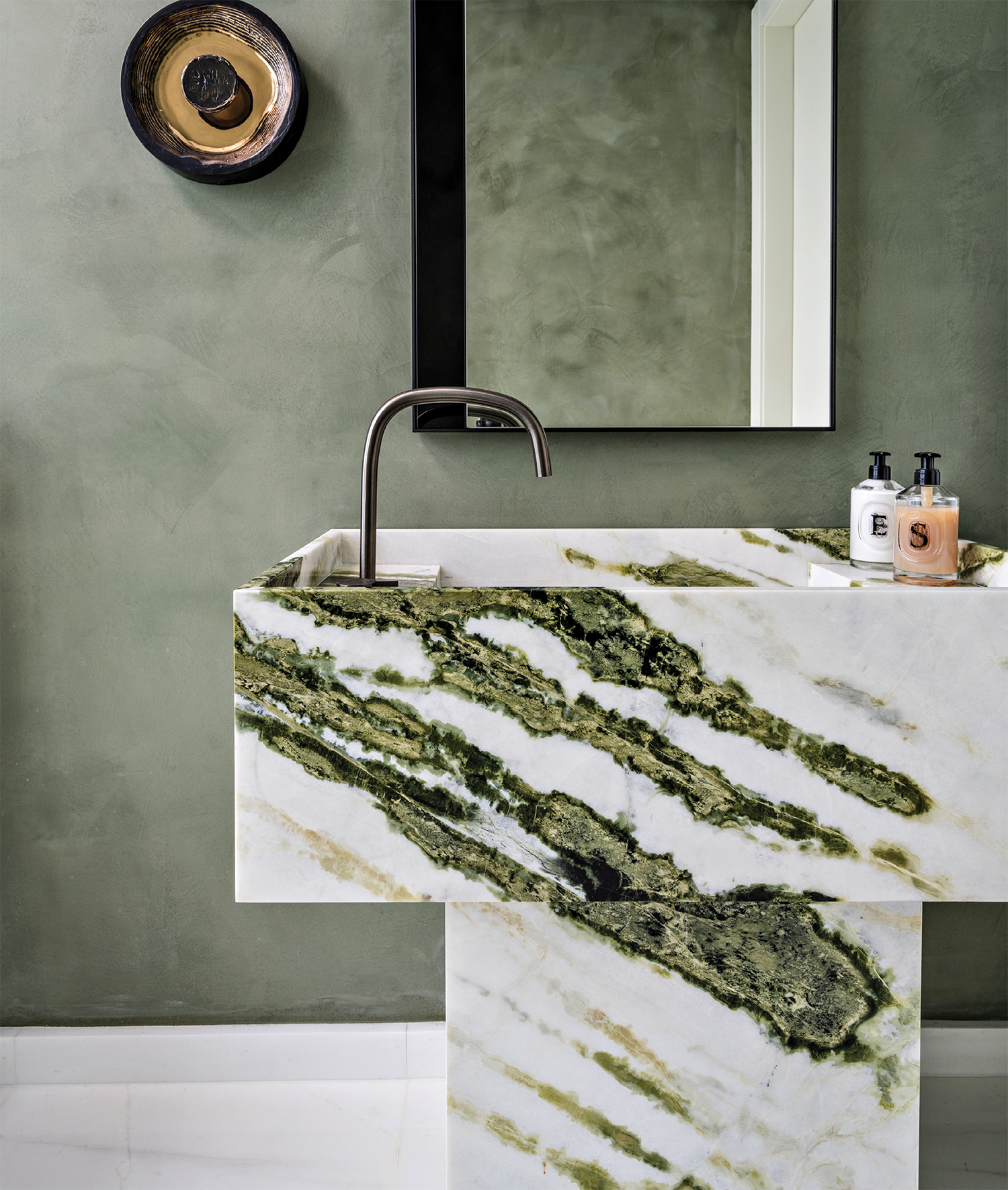 powder room with a Calacatta green marble vanity