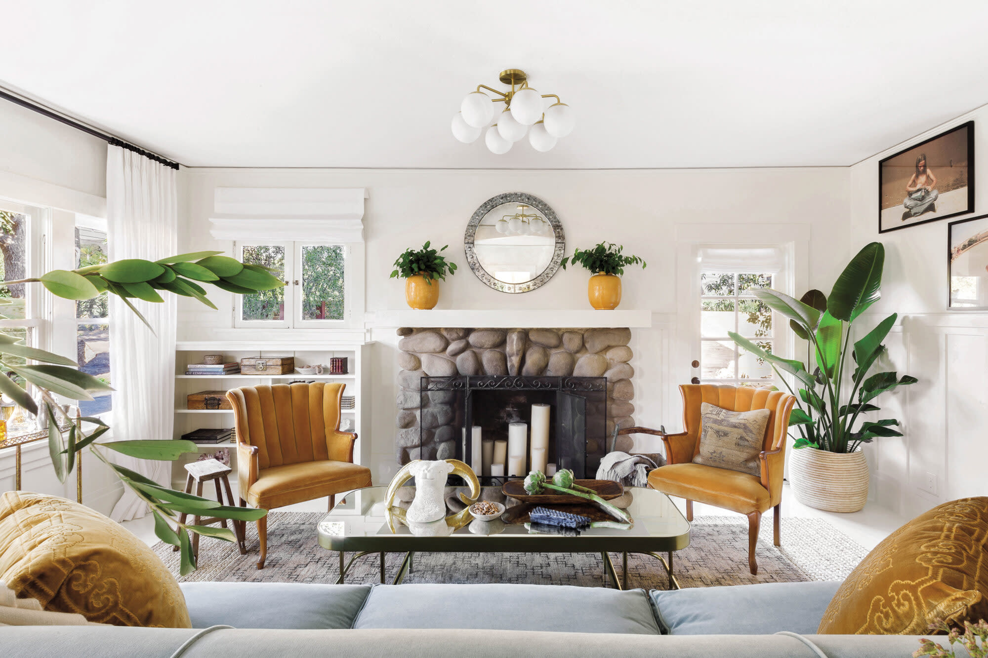 Symmetrical living room with fireplace and chairs