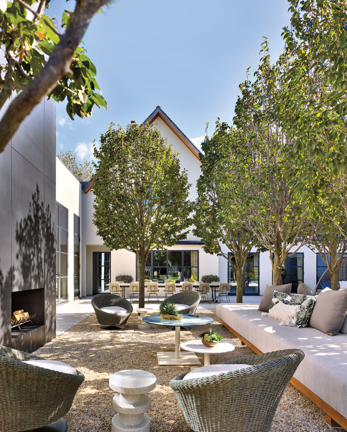 outdoor lounge area of a Hamptons home with a European vibe