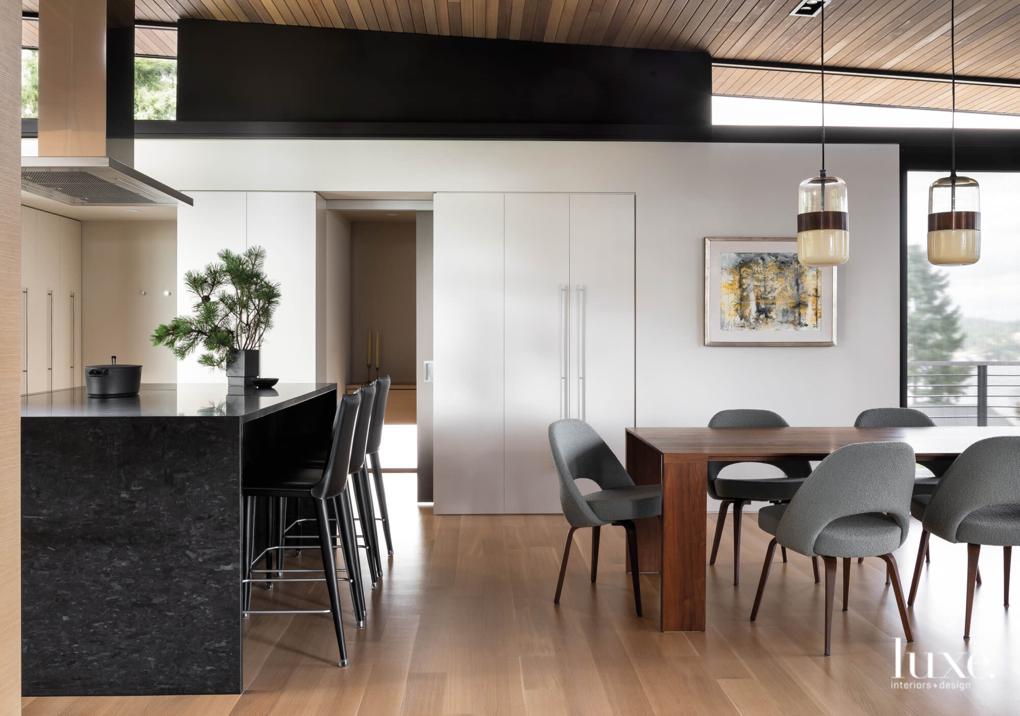 DIning room with adjacent kitchen area