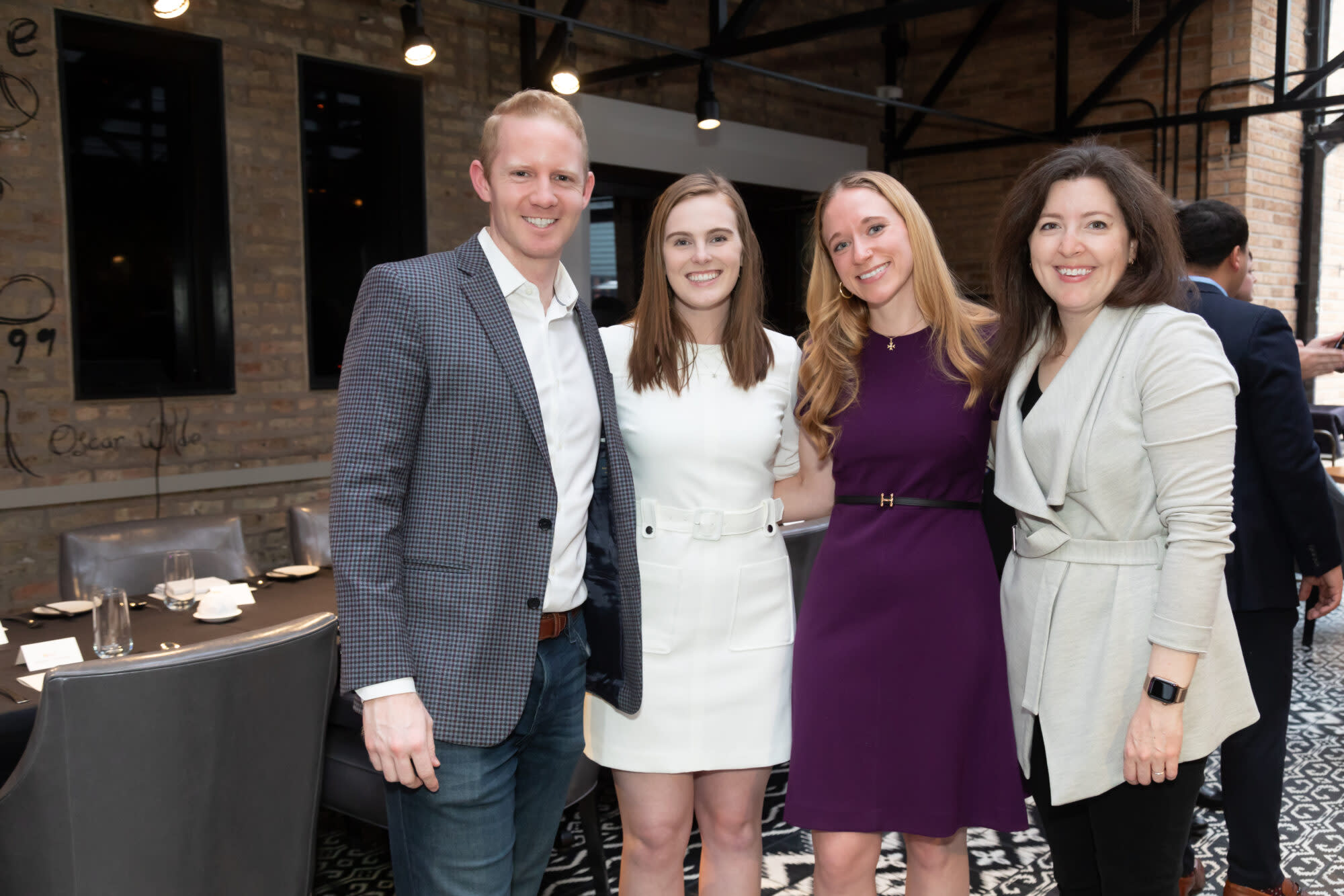 a man and three ladies