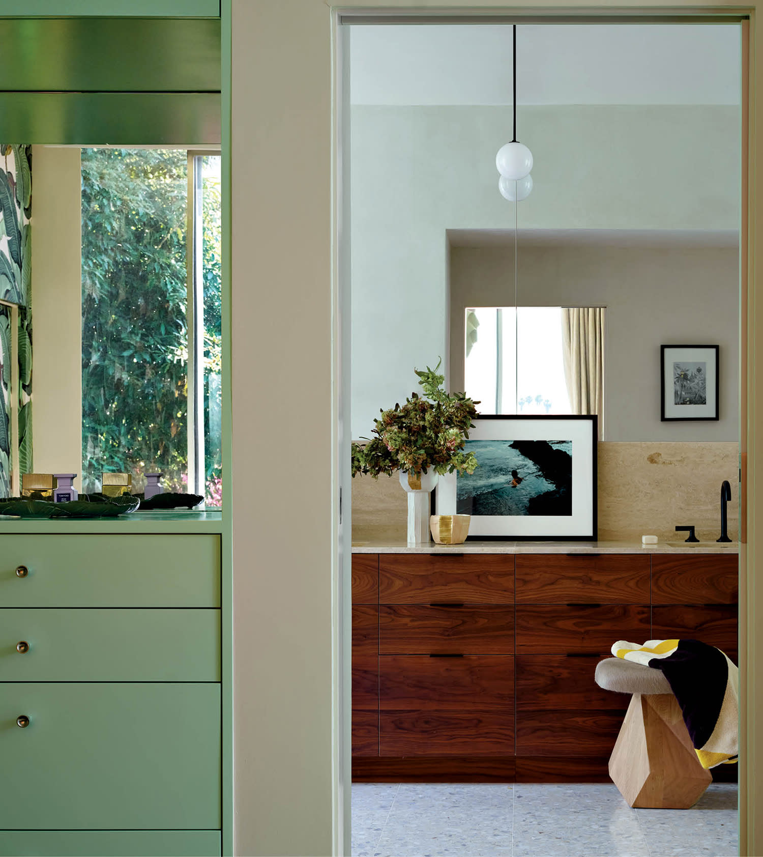 midcentury modern-style bathroom with limewashed walls and a geometric stool