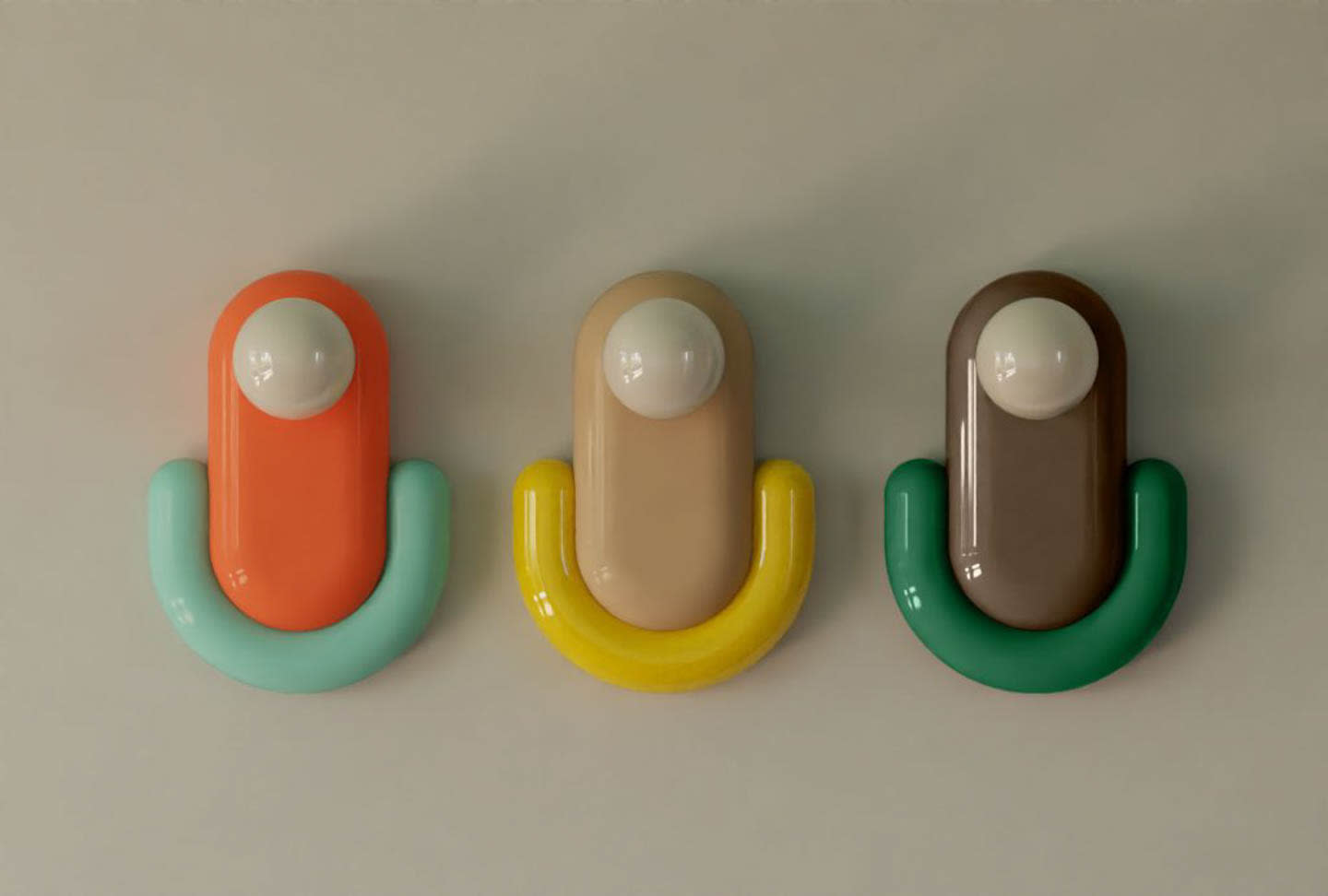 rounded eclair-shaped wall lights in a retro color palette