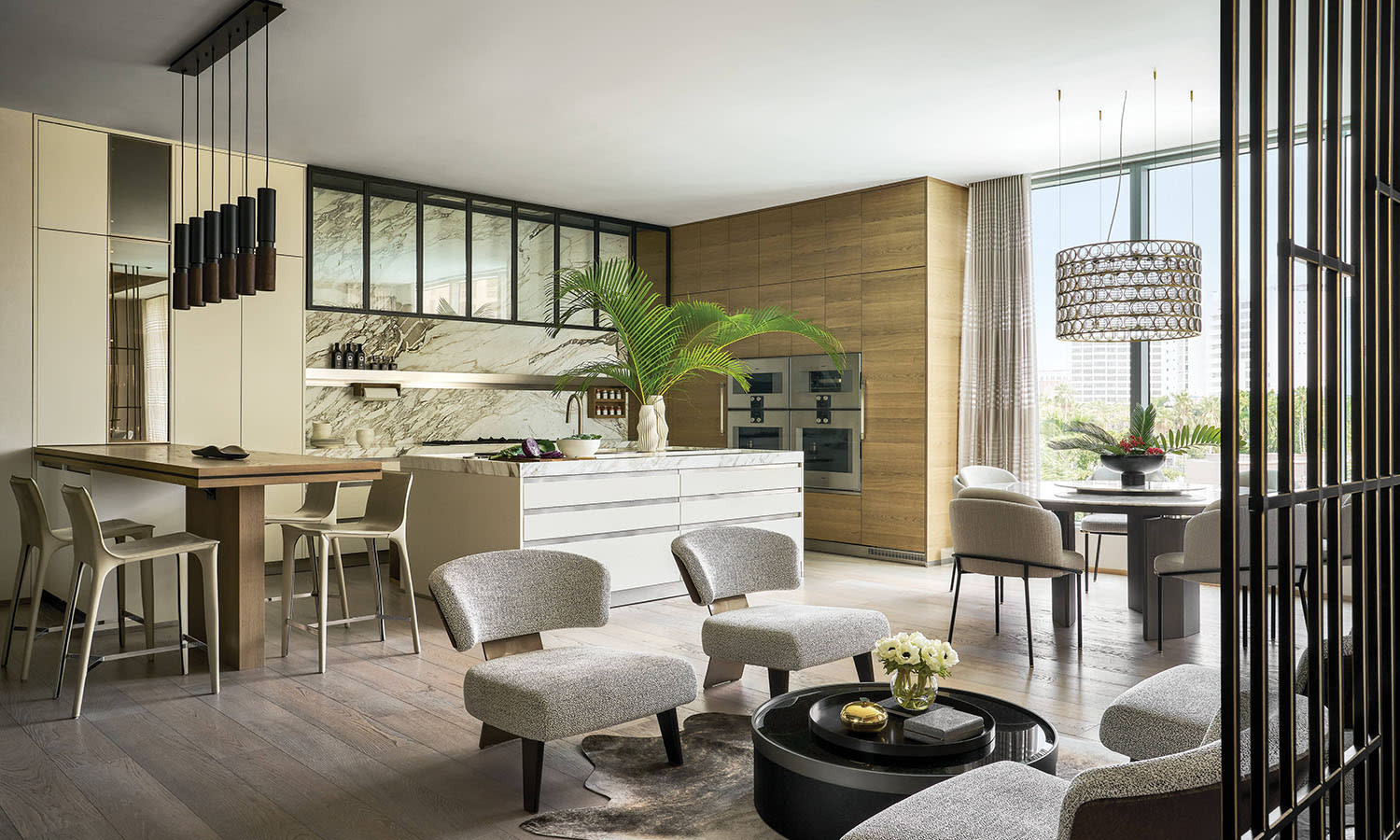 contemporary open concept kitchen with Calacatta marble backsplash