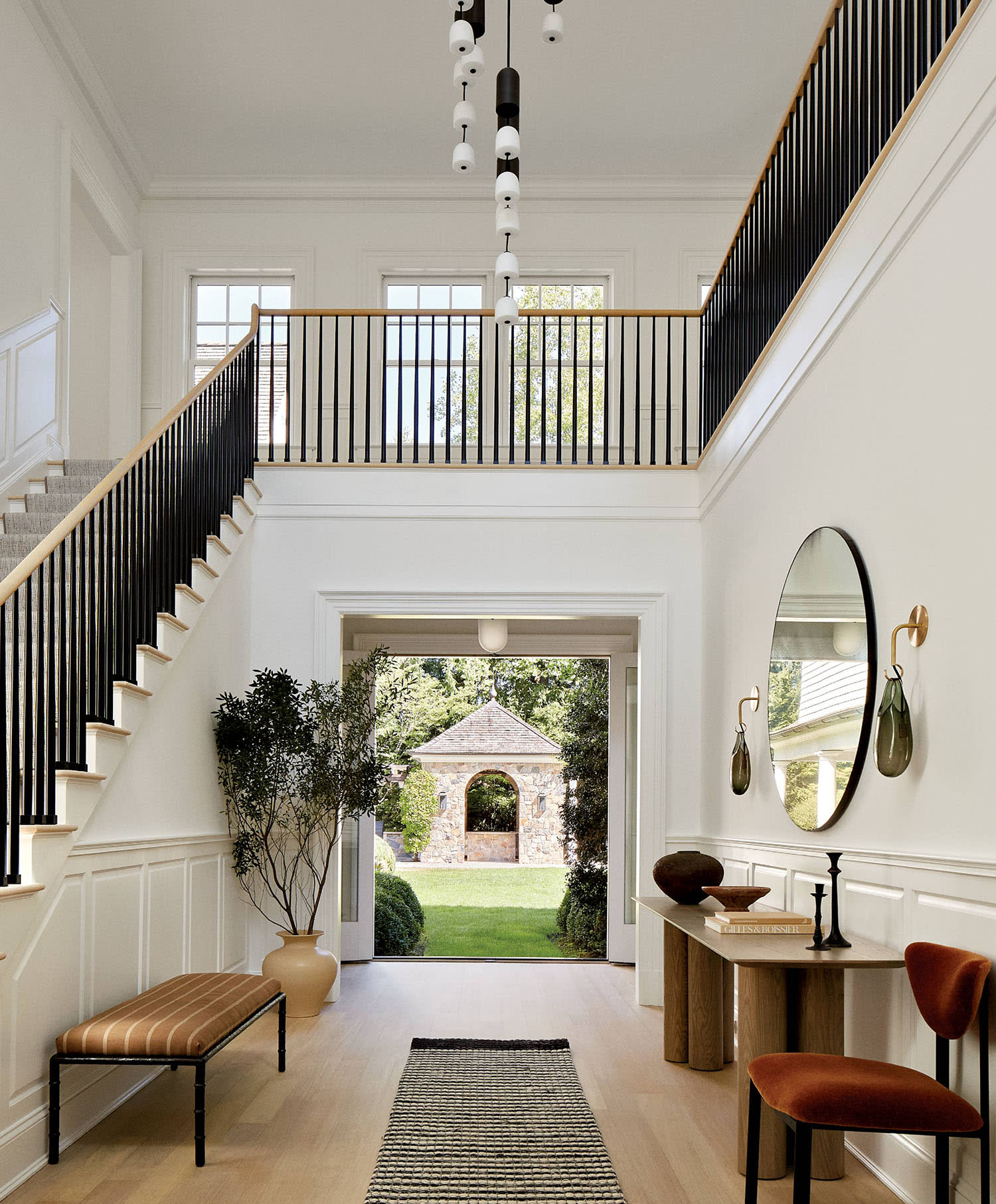 contemporary white foyer in a Connecticut home