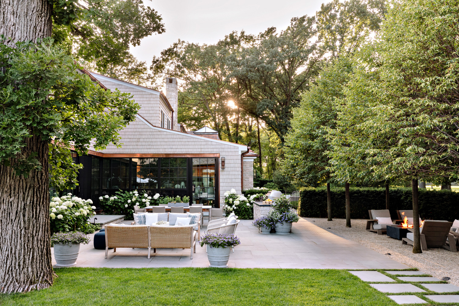 lush outdoor patio and fire pit