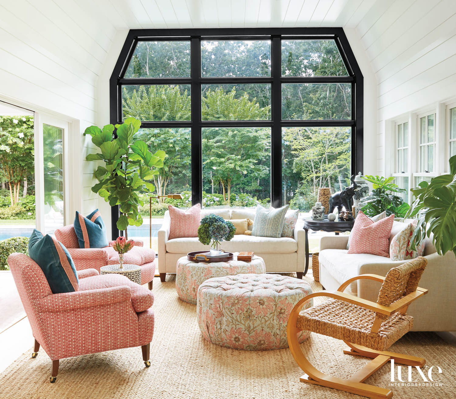 Floor to ceiling windows with custom sofas