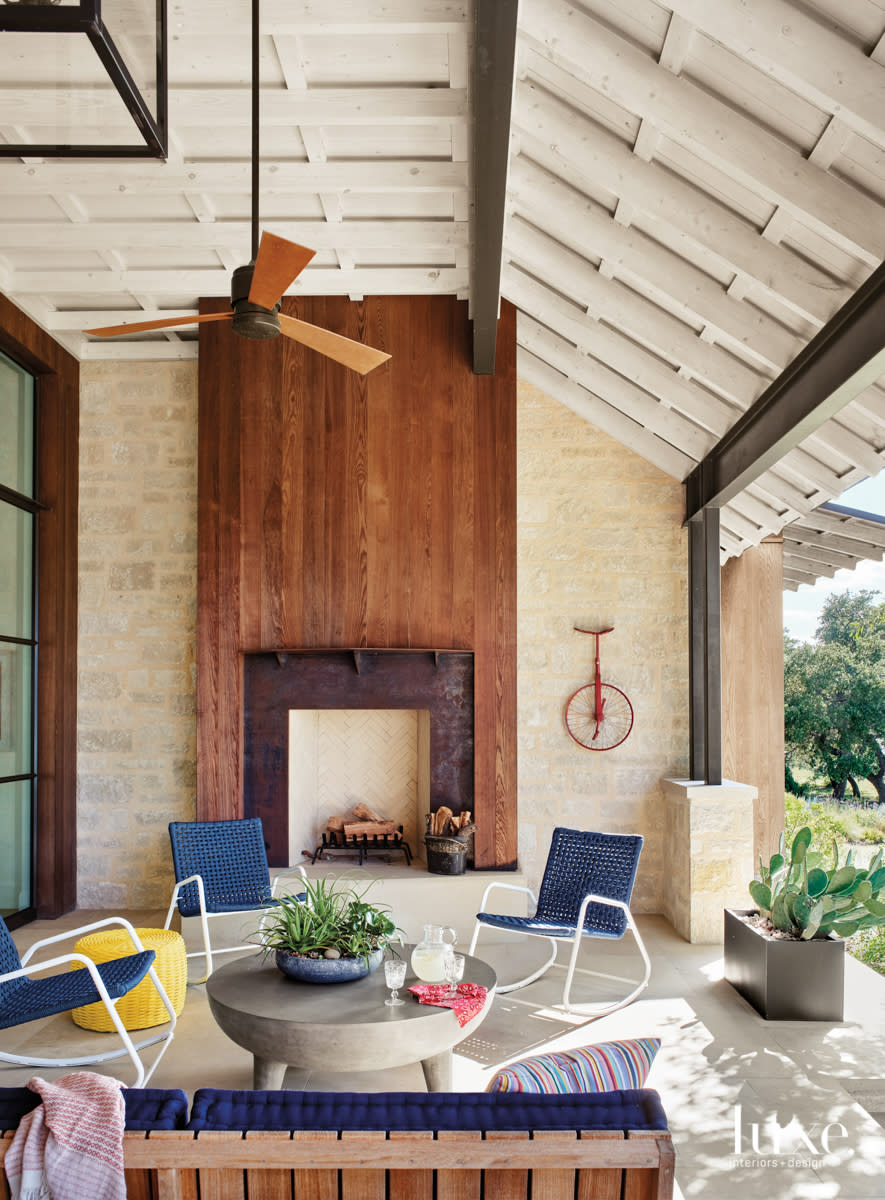 Covered porch with a colorful mix of furnishings