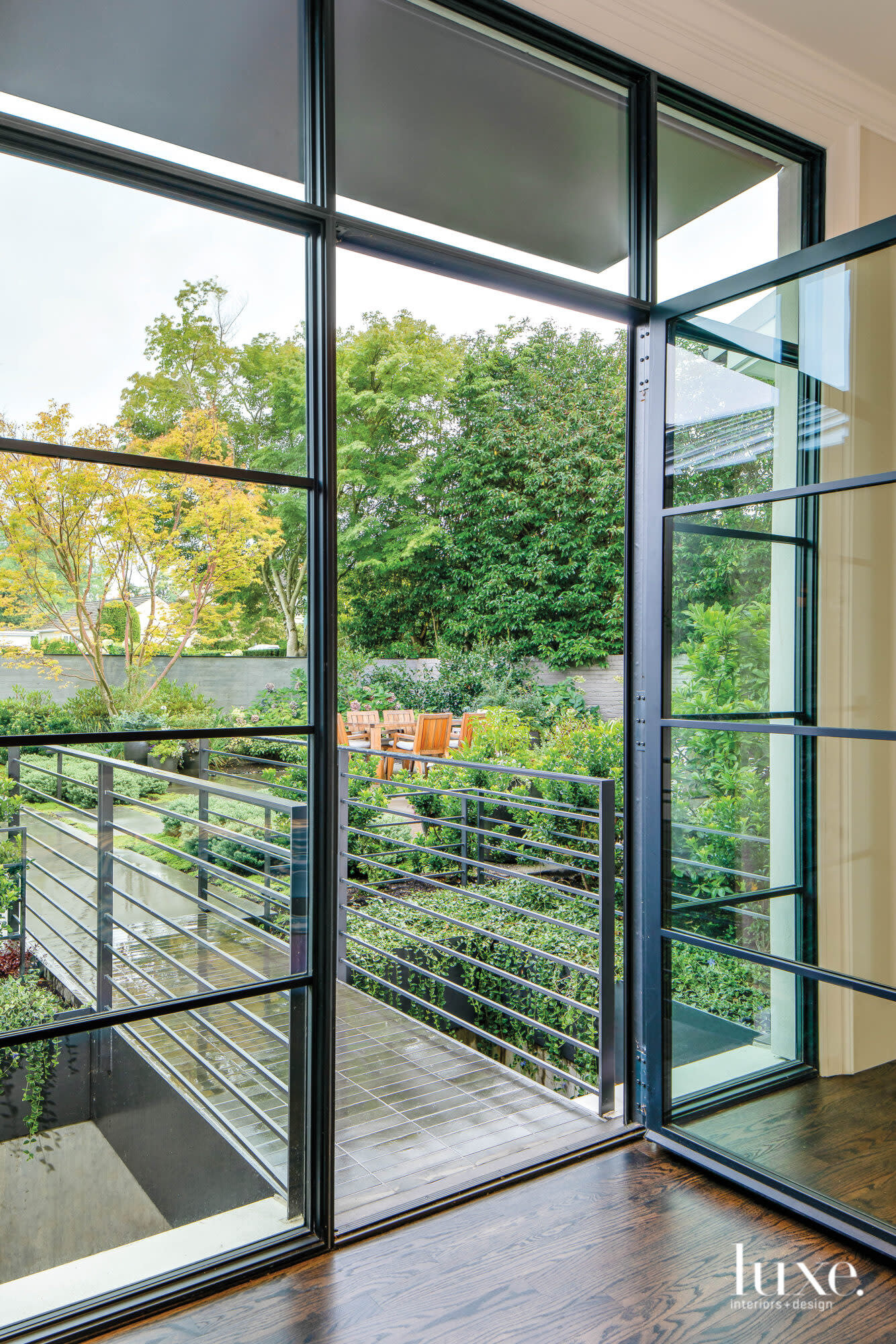 View of entry through front door and to landscaped courtyard