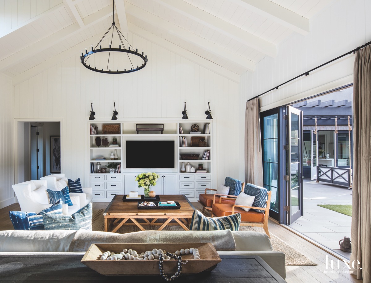 contemporary living room coffee table chandelier jute rug