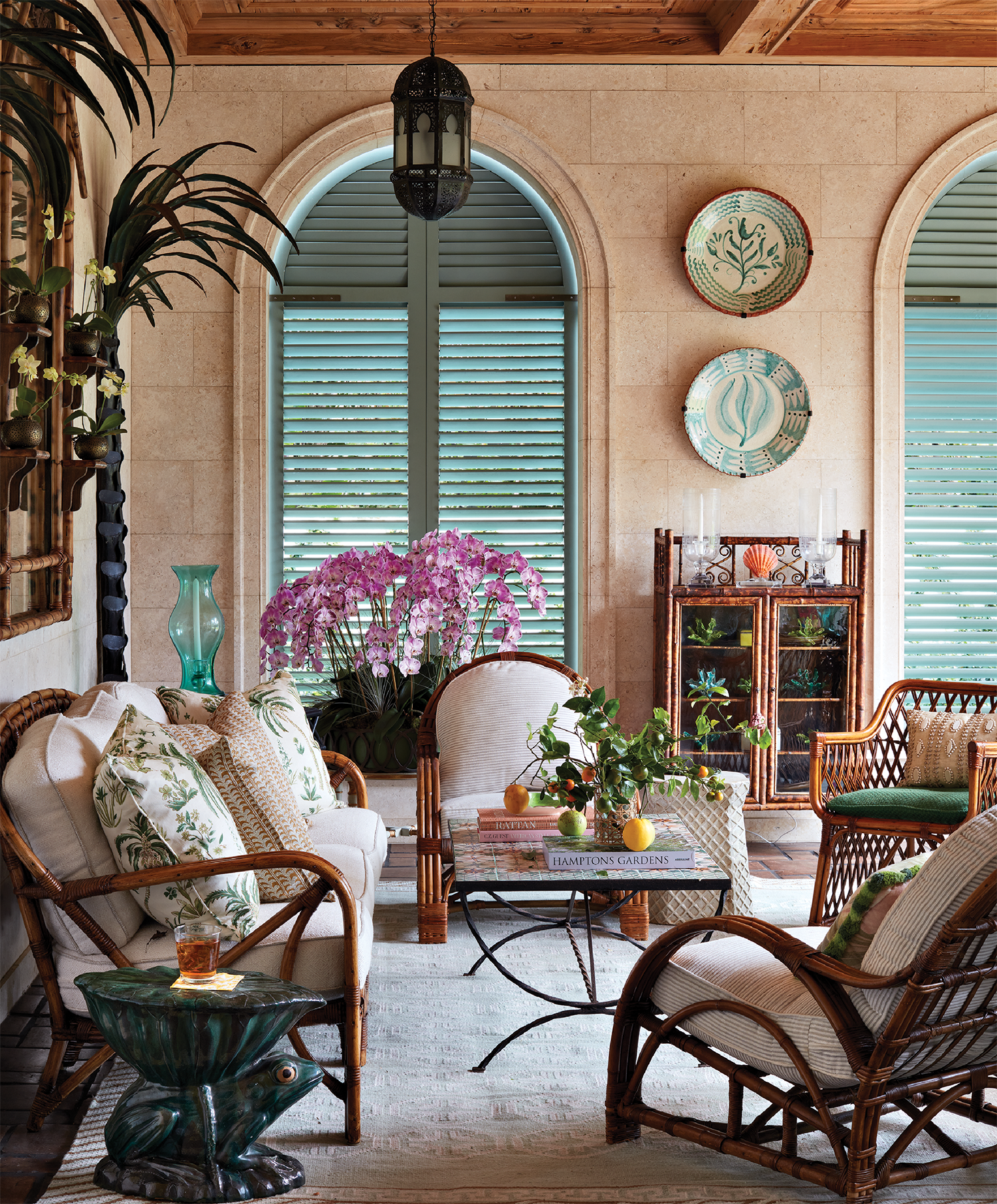 Palm Beach home's game room with arched windows