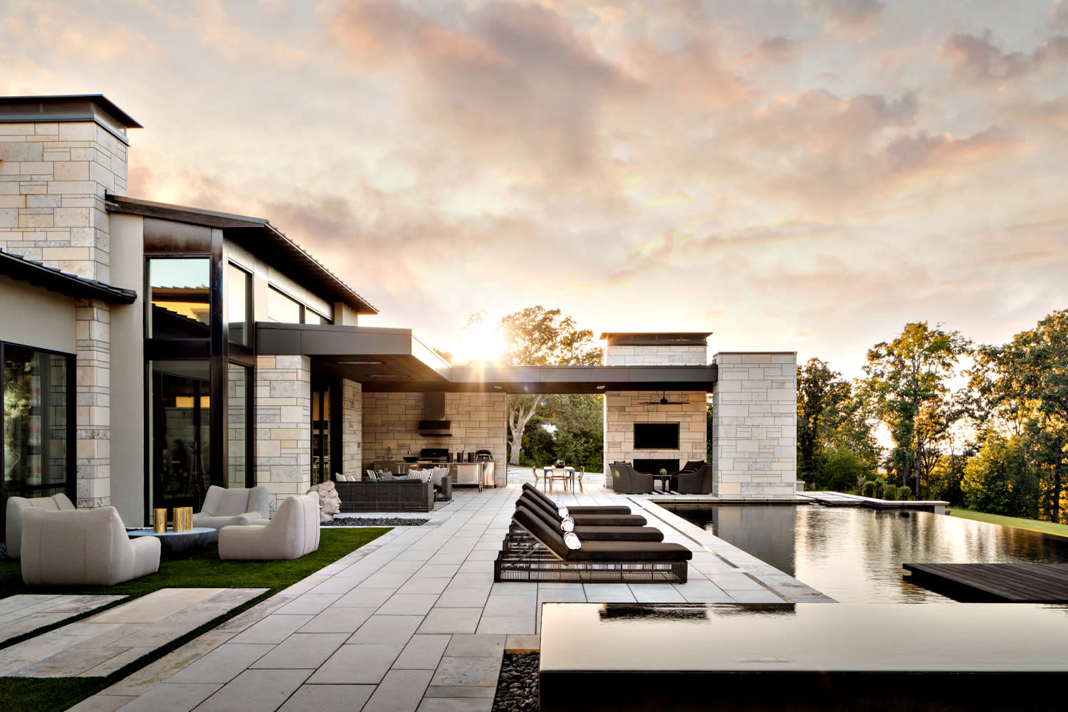 home backyard with pool, seating, Ozark views