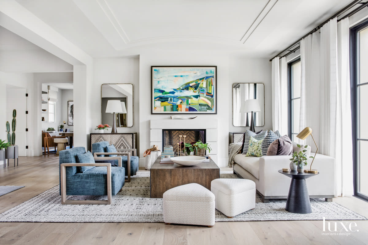 contemporary living room neutral palette blue accents