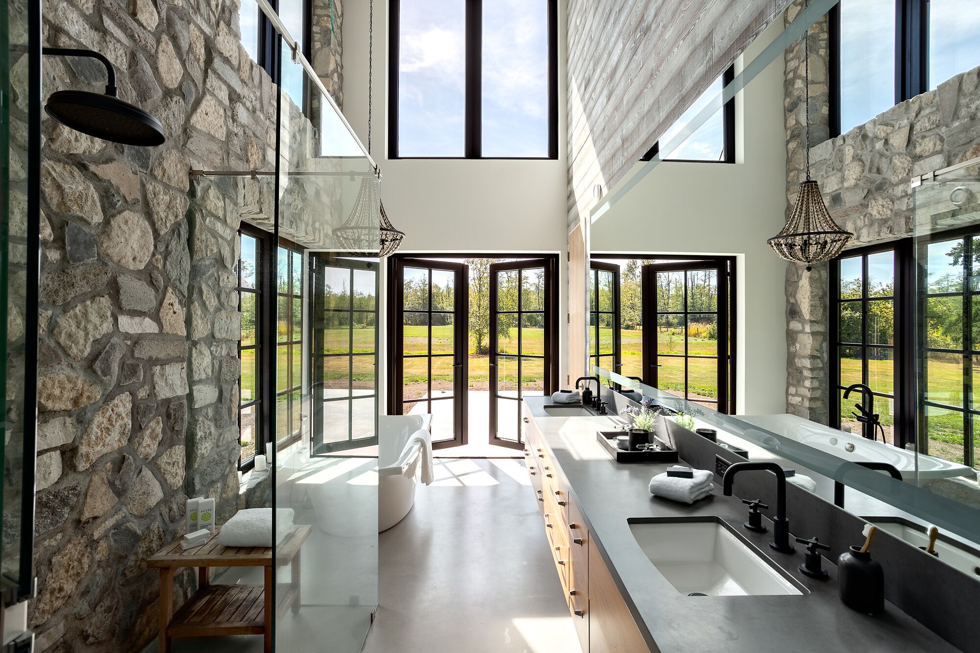 rustic bathroom with stone walls