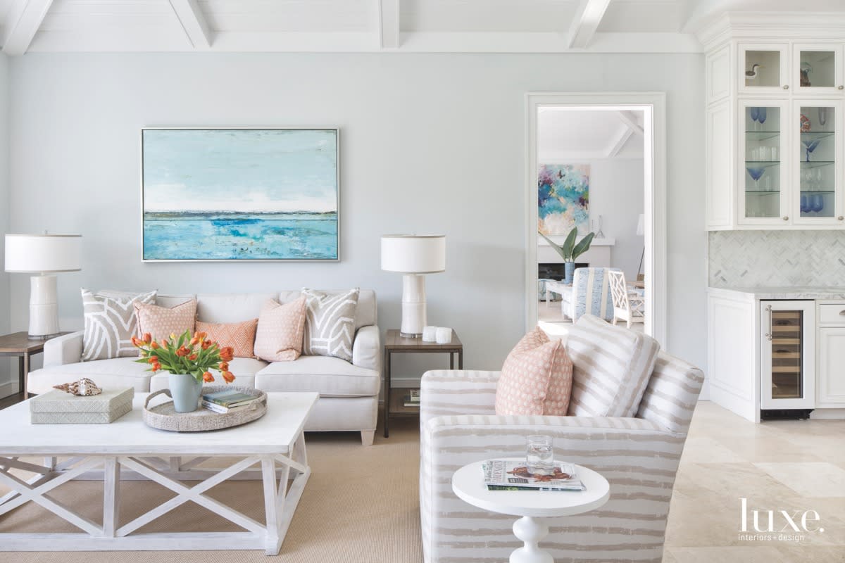 coastal living room neutral with pink accents