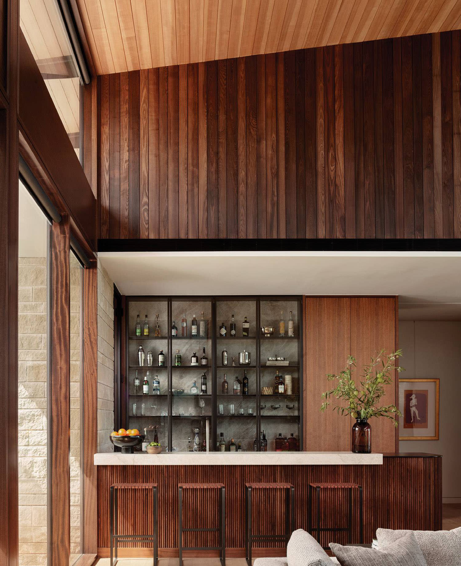 wood paneled home bar