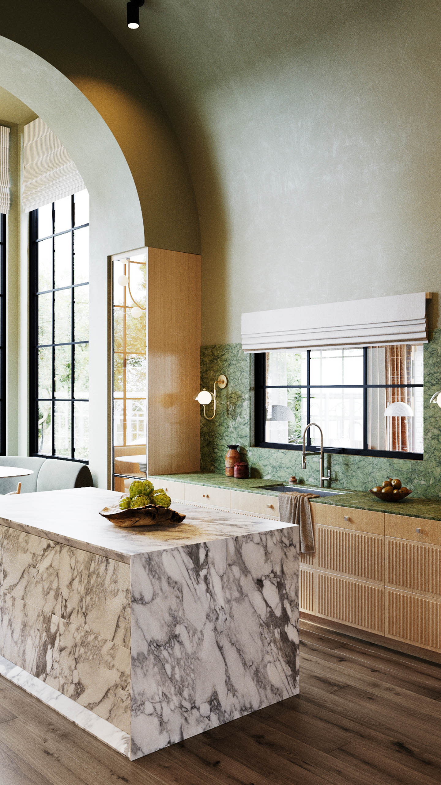 A contemporary kitchen showcasing a marble island and a window that provides ample natural light.