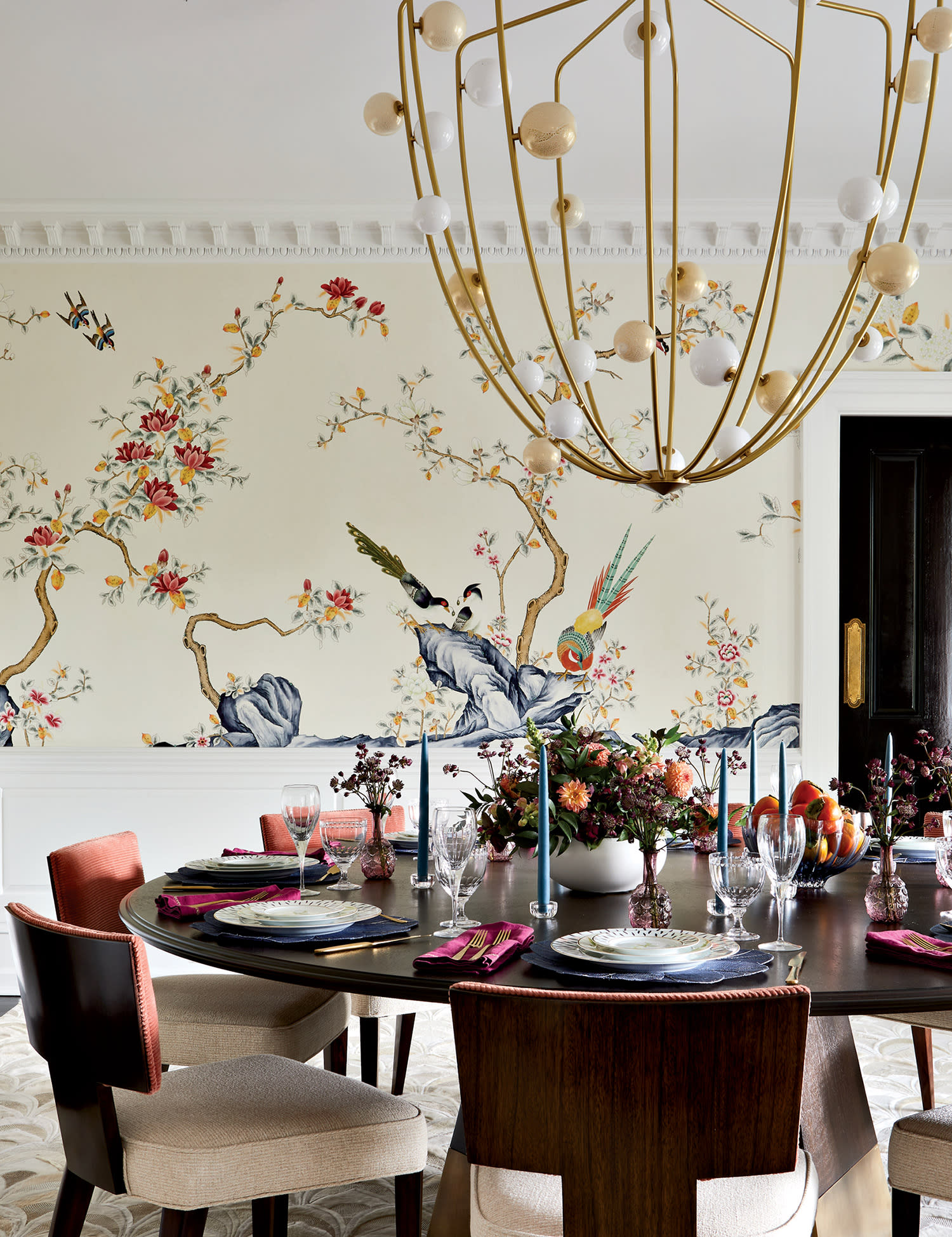 dining room surrounded by an Asian-inspired floral wallpaper