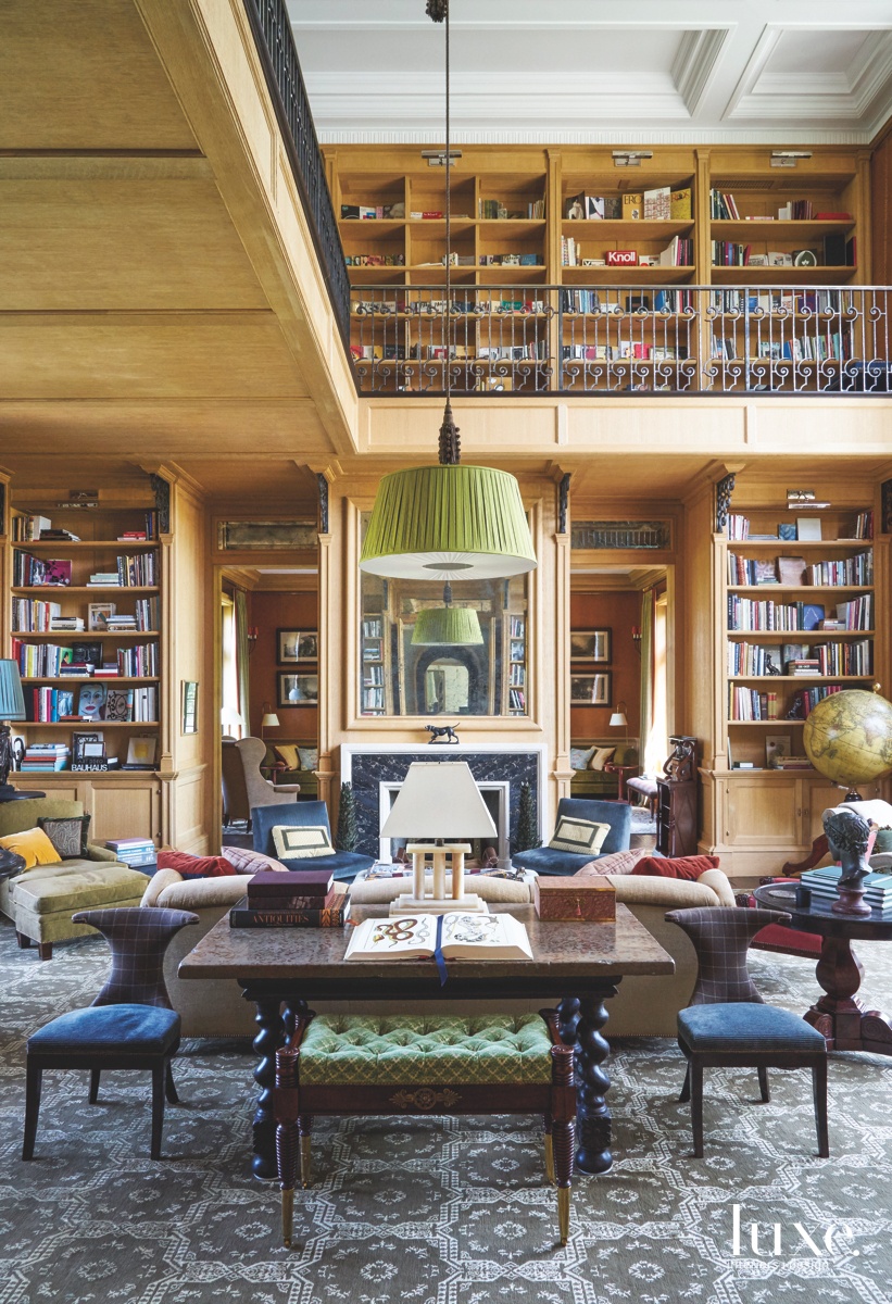 traditional library bookshelves fireplace