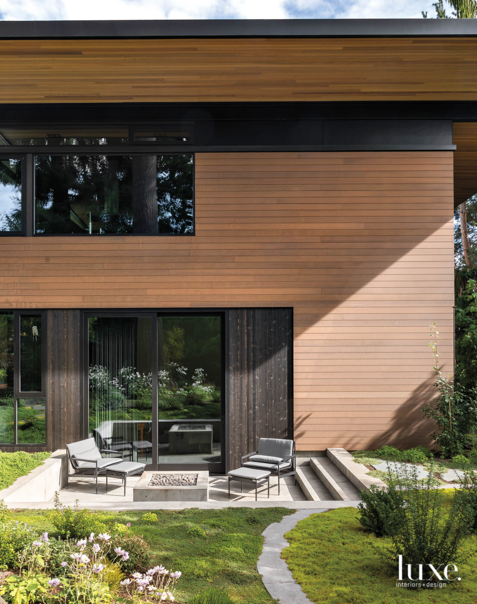 Exterior shot with seating area off den