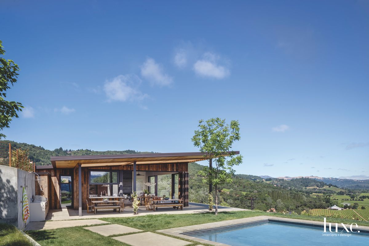 exterior of Sonoma County house overlooking pool with landscape architecture by Gretchen Whittier