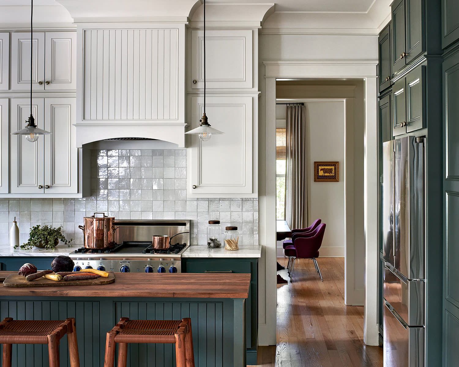 traditional-style kitchen with white zellige tile backsplash and teal accents