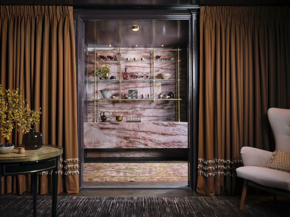 The award-wining team at Liz MacPhail Interiors created this dramatic wine room and bar for the most inspired of oenophiles.