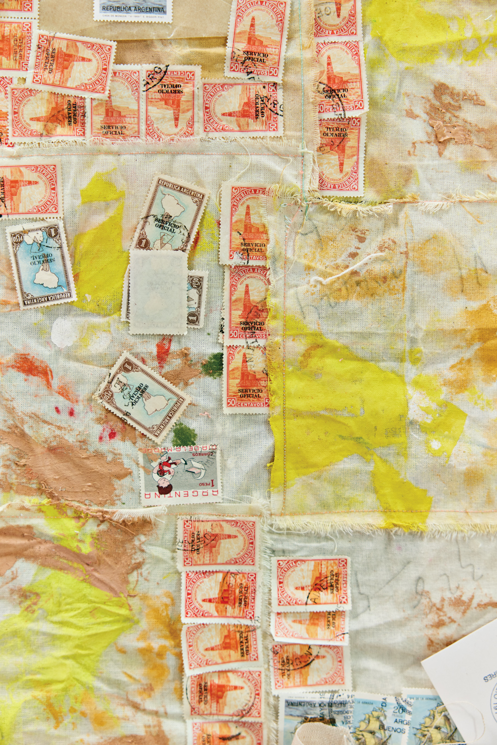 Textiles and stamps cover Veronica Pasman's workspace