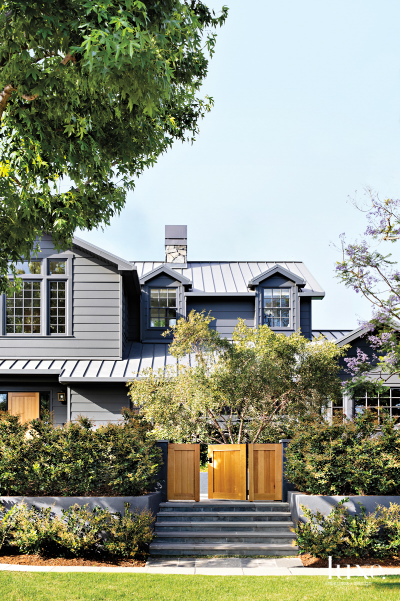 Facade of a house with a dark gray stain