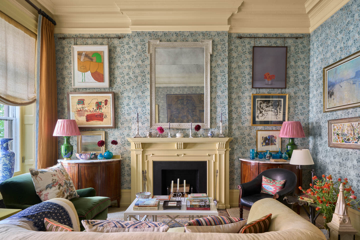English-inspired living area with a blue and white floral wallpaper 