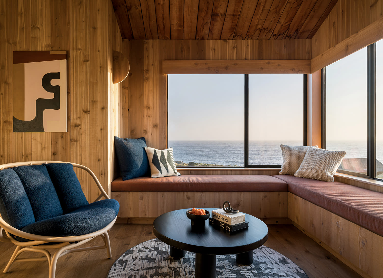 banquette seating along a window inside Sea Ranch Lodge