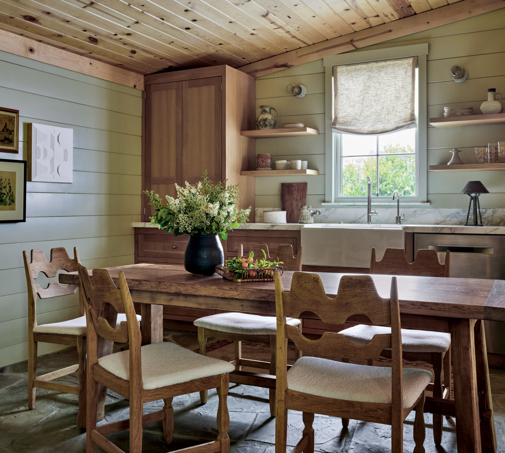 rustic dining room with a wood table and matching chairs